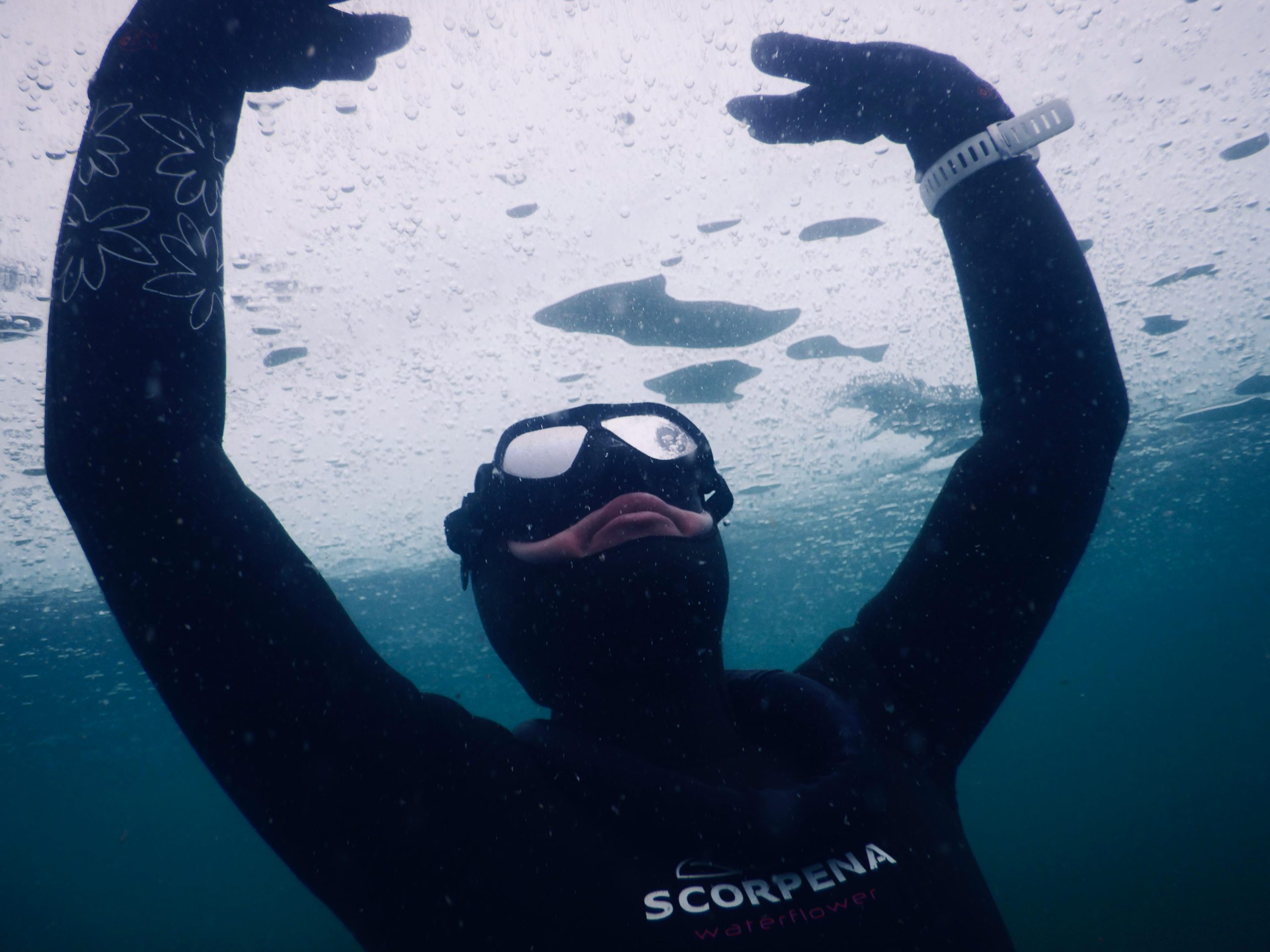 What to Wear under a Wetsuit in Cold Water